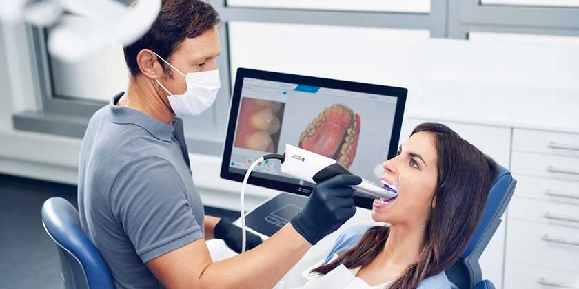 Modern dental scanner in use